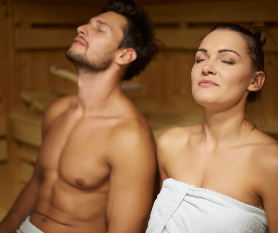 couple sitting in a sauna